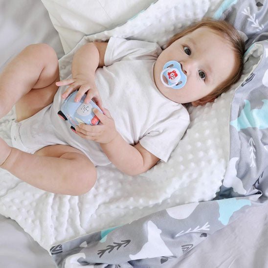 couverture-bebe-fille-plume