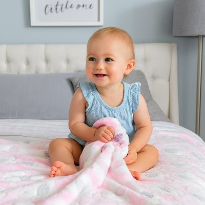 bebe heureux couverture dumbie rose