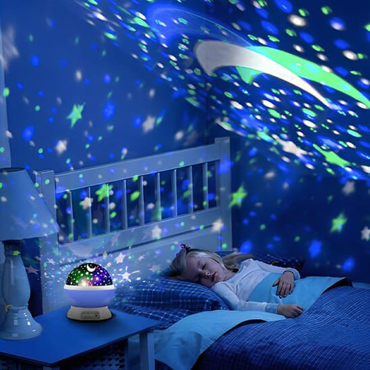 fille endormie veilleuse bebe projection plafond etoiles